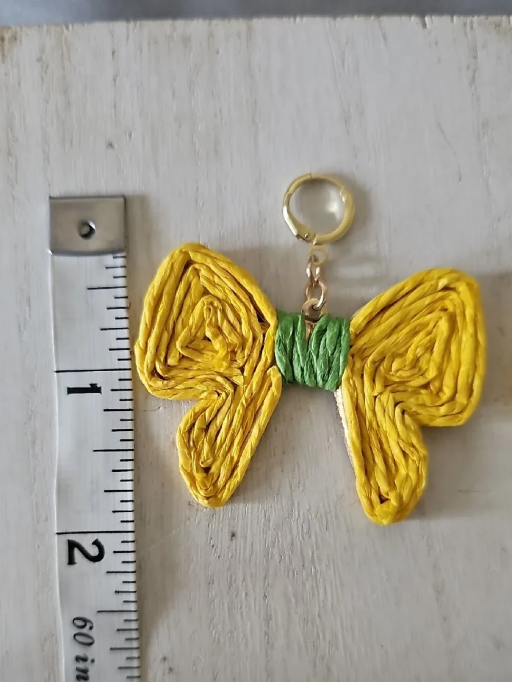 Yellow Bow Drop Earrings with Green Accent